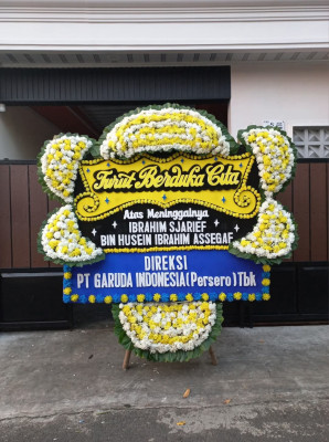 Papan Bunga Duka di Mugi
