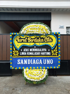 Papan Bunga Duka di Mugi